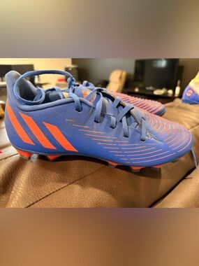 Women Blue Sport Cleats with Orange Accents